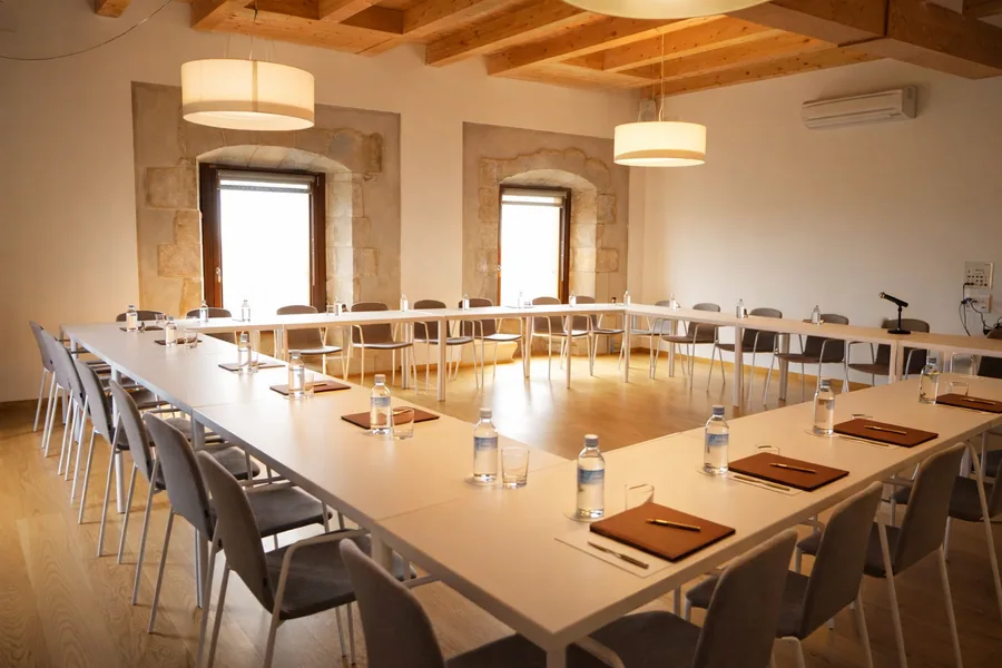 A meeting room at Hotel Santuari set up in a U-shape